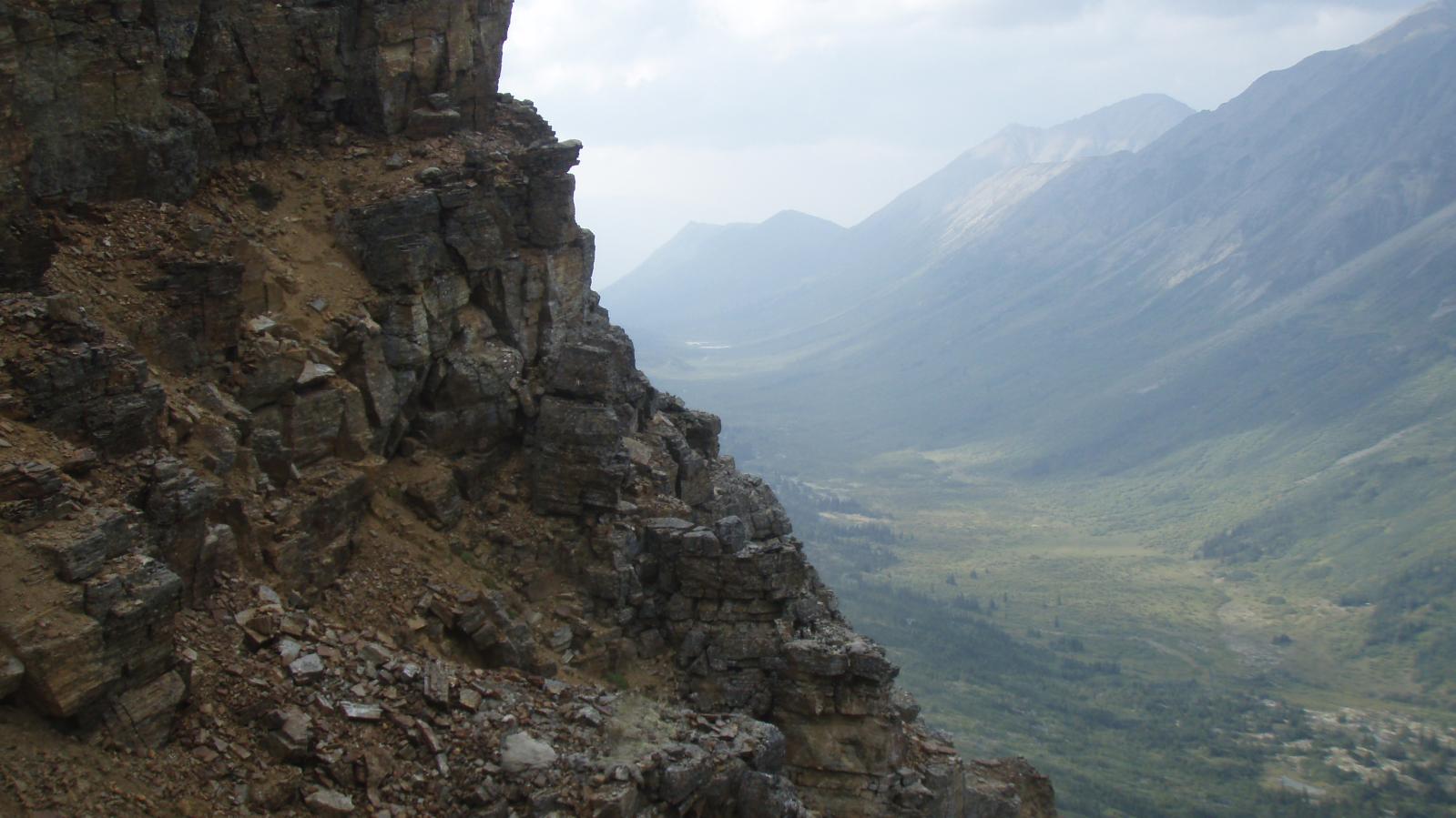 Cliff and mountain valley at teh titan Project in NW BC 